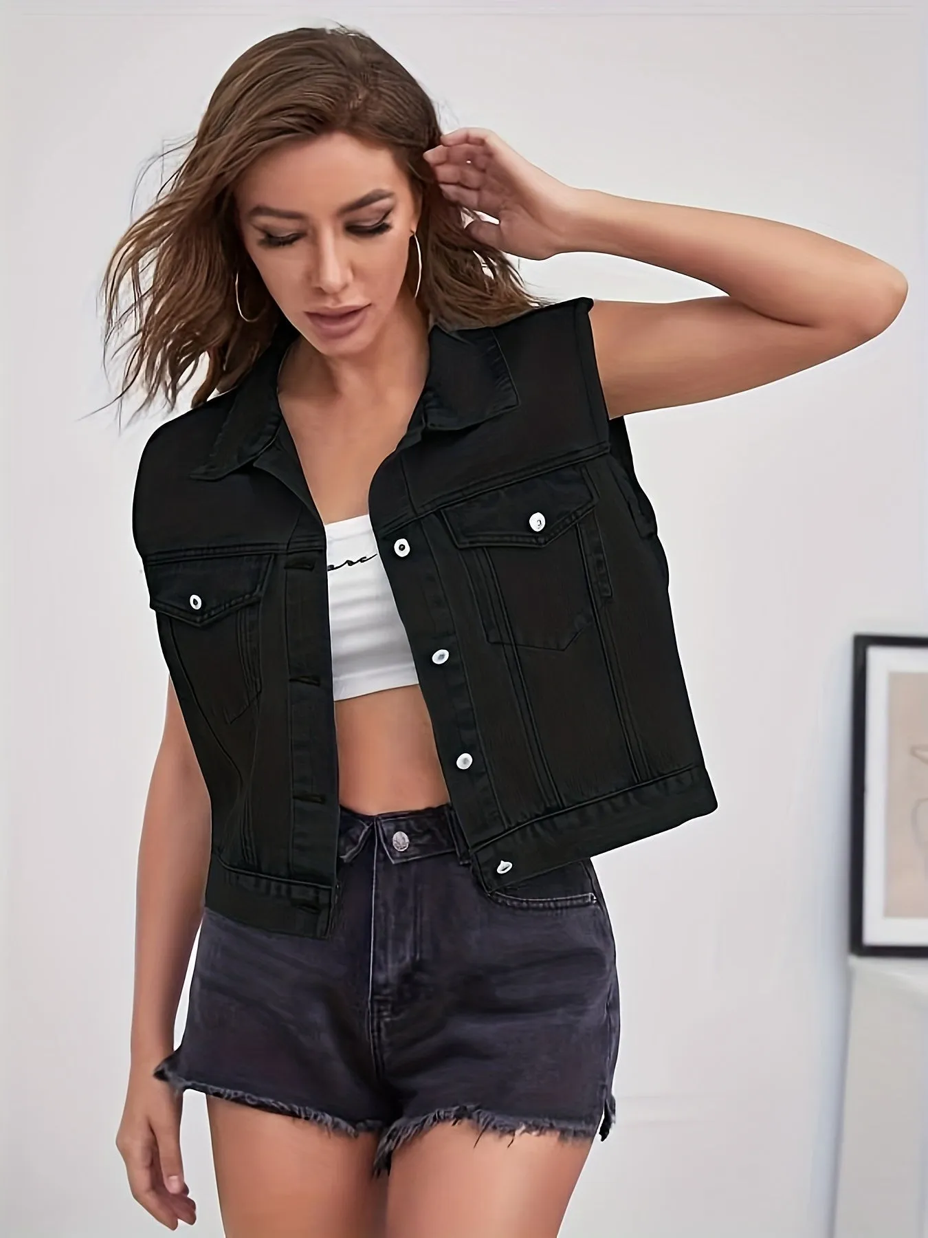 Ärmellose Jeansjacke mit Pattentaschen